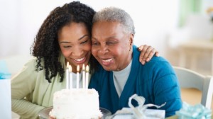 African American Women with Birthday cake