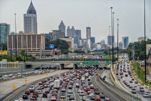 A depiction of Atlanta traffic with the skyline in the backdrop