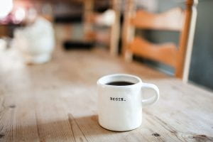 coffee mug with "begin"