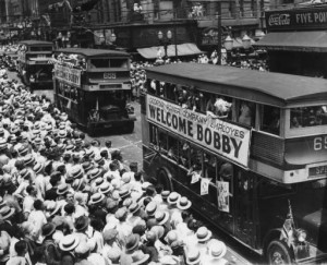Double-decker buses in parade welcoming Bobby Jones to Atlanta, Five Points, Atlanta, Georgia, July 14, 1930. (AJCP338-037f), Atlanta Journal-Constitution Photographic Archives. Special Collections and Archives, Georgia State University Library.