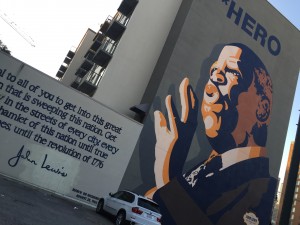 This is a painting of John Lewis, who was a politician and civil rights leader. This photo represent the historical figures who contributed to Auburn Avenue. He is now a U.S representative of Georgia and has served his time since 1987.