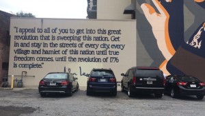 John Lewis's quote, by his mural, on Jesse Hill Jr. Drive.