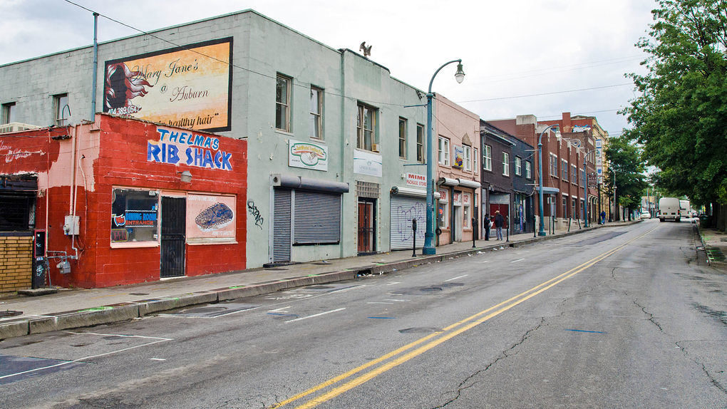 Businesses boarded up and abandoned on Auburn Avenue