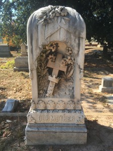 Tombstone near entrance to cemetery