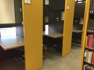 These cubicles are provided on the sides of the book stacks, and allow students to have a private seating area.