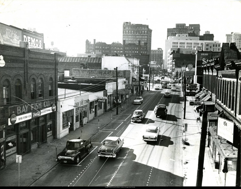 View_of_Decatur_Street_storefronts_1950s