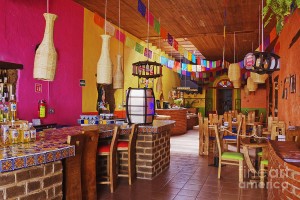 This is a picture of a very colorful restaurant. Every aspect of the built environment has some sort of color in it. And from one place you can feel a particular mood.